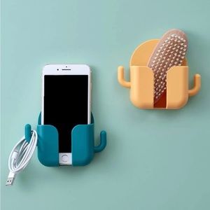Wall mounted plug holder for phones and any hand on accessories